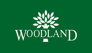 woodland showroom jaipur Logo